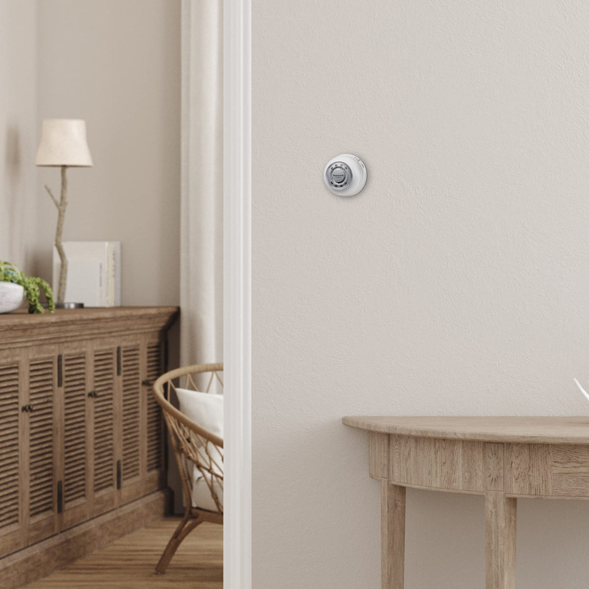 Honeywell Home round thermostat mercury-free design with decorative ring.