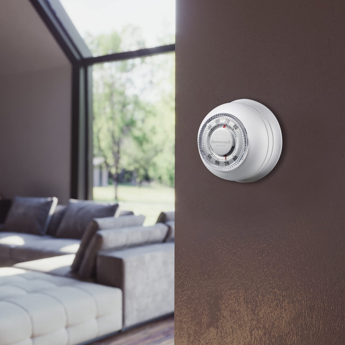 Honeywell Home Round thermostat mercury-free design supports safe heating control.