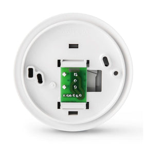 Honeywell Home Round thermostat white finish blends with modern interiors.