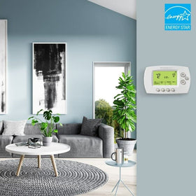 Honeywell Home RTH6580WF app screen enables remote programming and energy scheduling.