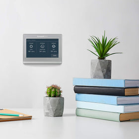 RTH9585WF1004 wall installation shows a clean, DIY-friendly setup.