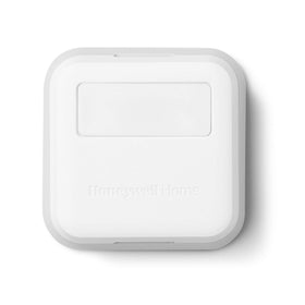 Honeywell Home smart room sensor front view, compact design for flexible room placement.
