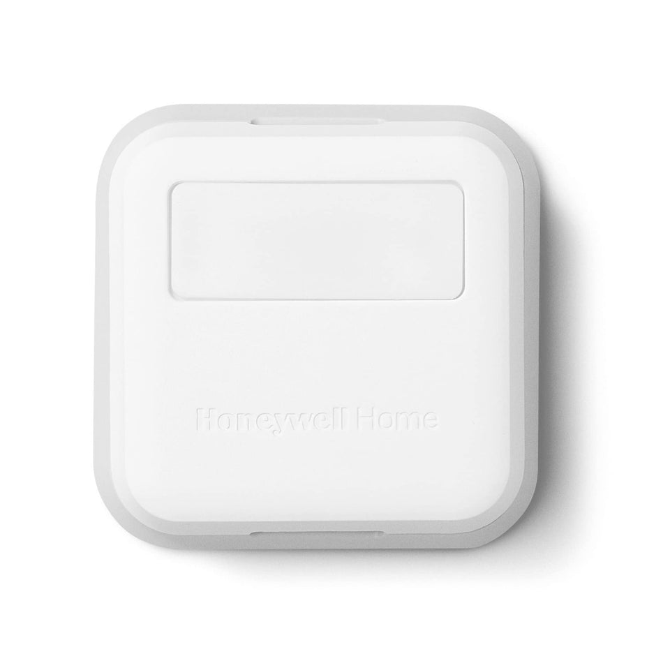 Honeywell Home smart room sensor front view, compact design for flexible room placement.