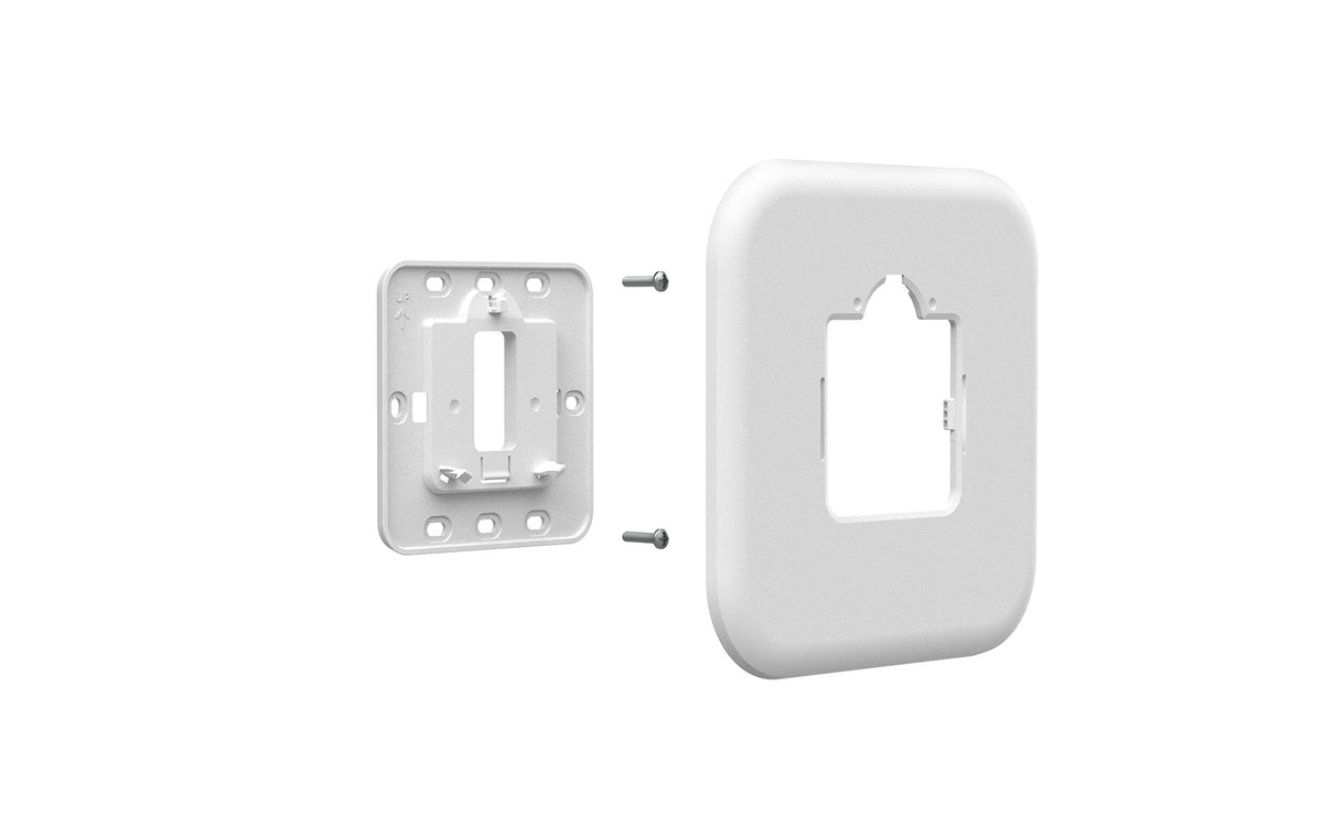 Honeywell Home THP2400A1080 cover plate on wall hides marks for a cleaner look.
