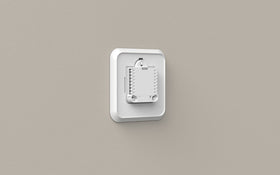Honeywell Home installed example shows clean, professional finish.