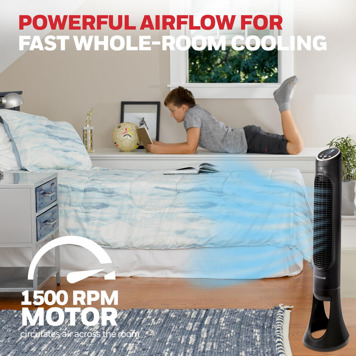 Oscillating Honeywell QuietSet tower fan distributes air across the room