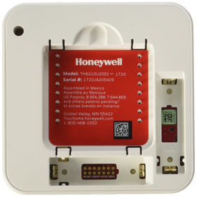 Close-up of programming panel on Honeywell TH6210U2001/U for precise control.