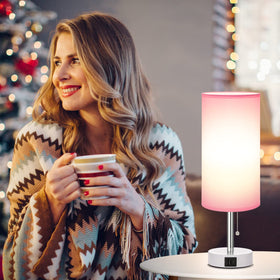 Hong-in pink bedside lamp with pull chain for easy on/off.