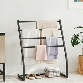 Honiter towel rack in bathroom setting as a freestanding solution.