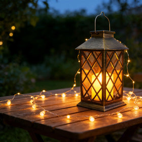 HOOEN lantern on a window sill adding subtle indoor light