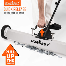 HORUSDY Front view of rolling sweeper sweeping metal from the floor.
