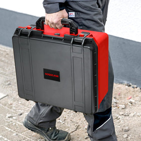 On-site setup with Milwaukee inflator case ready for roadside maintenance.