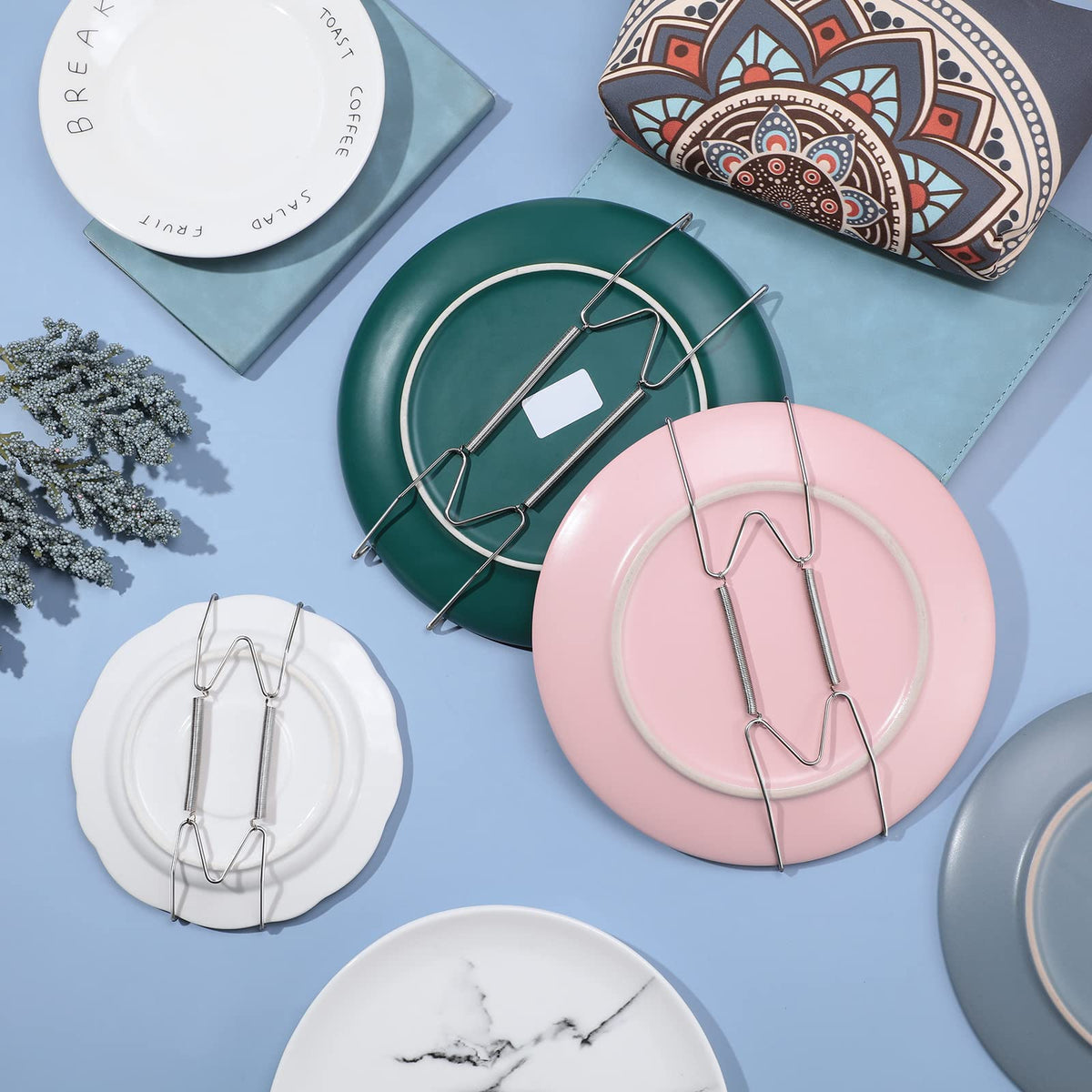 Hotop wall display featuring silver plate hangers and plates in harmony