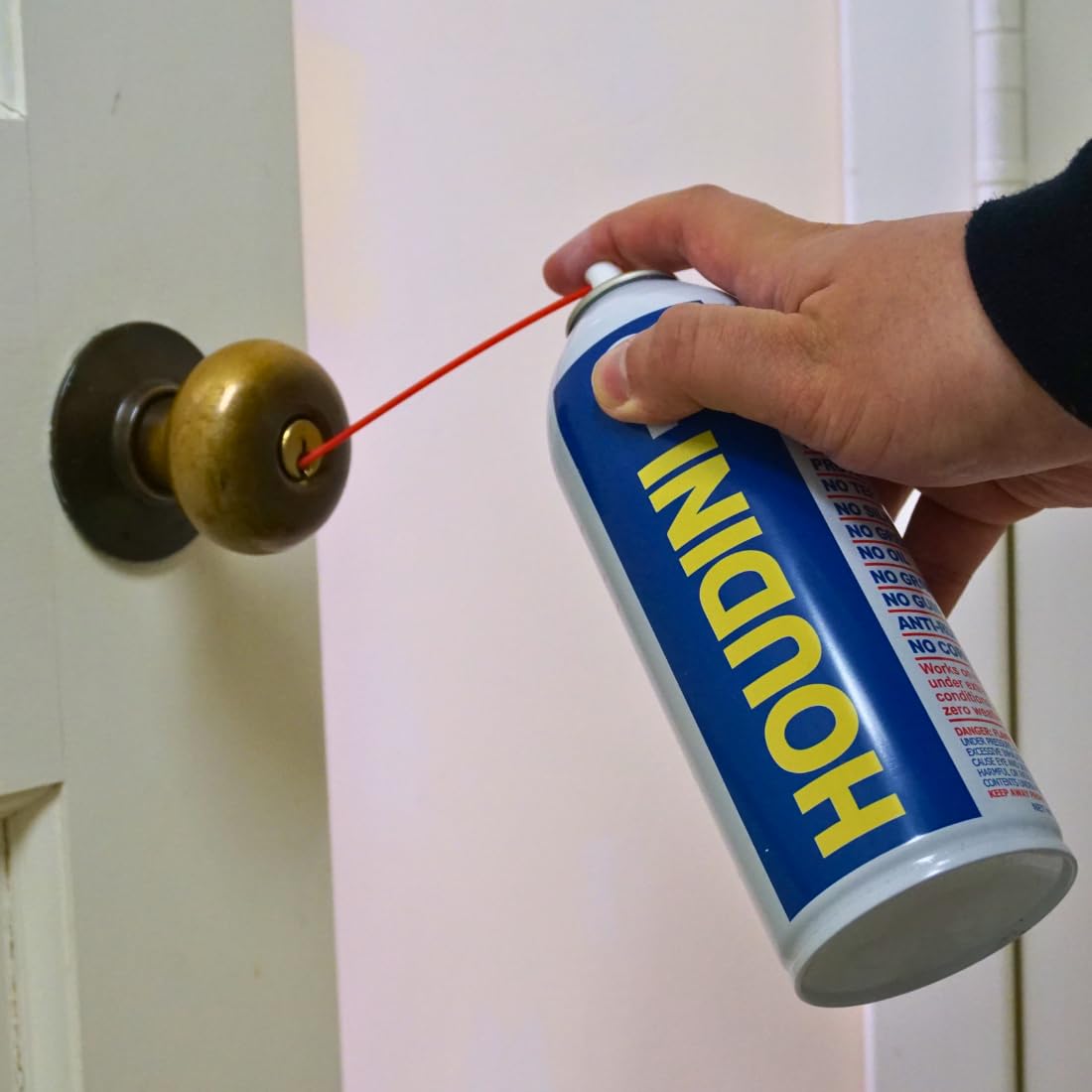 Houdini Lock Lube nozzle closeup highlights precise, residue-free application.