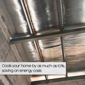 Houseables Radiant Barrier roll safety label closeup confirms ASTM compliance and fire-grade rating.