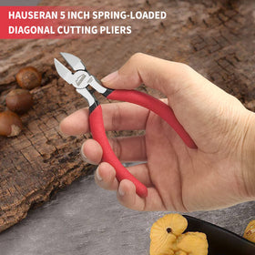 HOUSERAN precision cutters in use for detailed crafting work