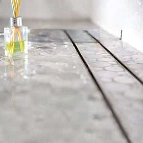 HTOH adjustable feet ensure level installation on uneven bathroom floors.