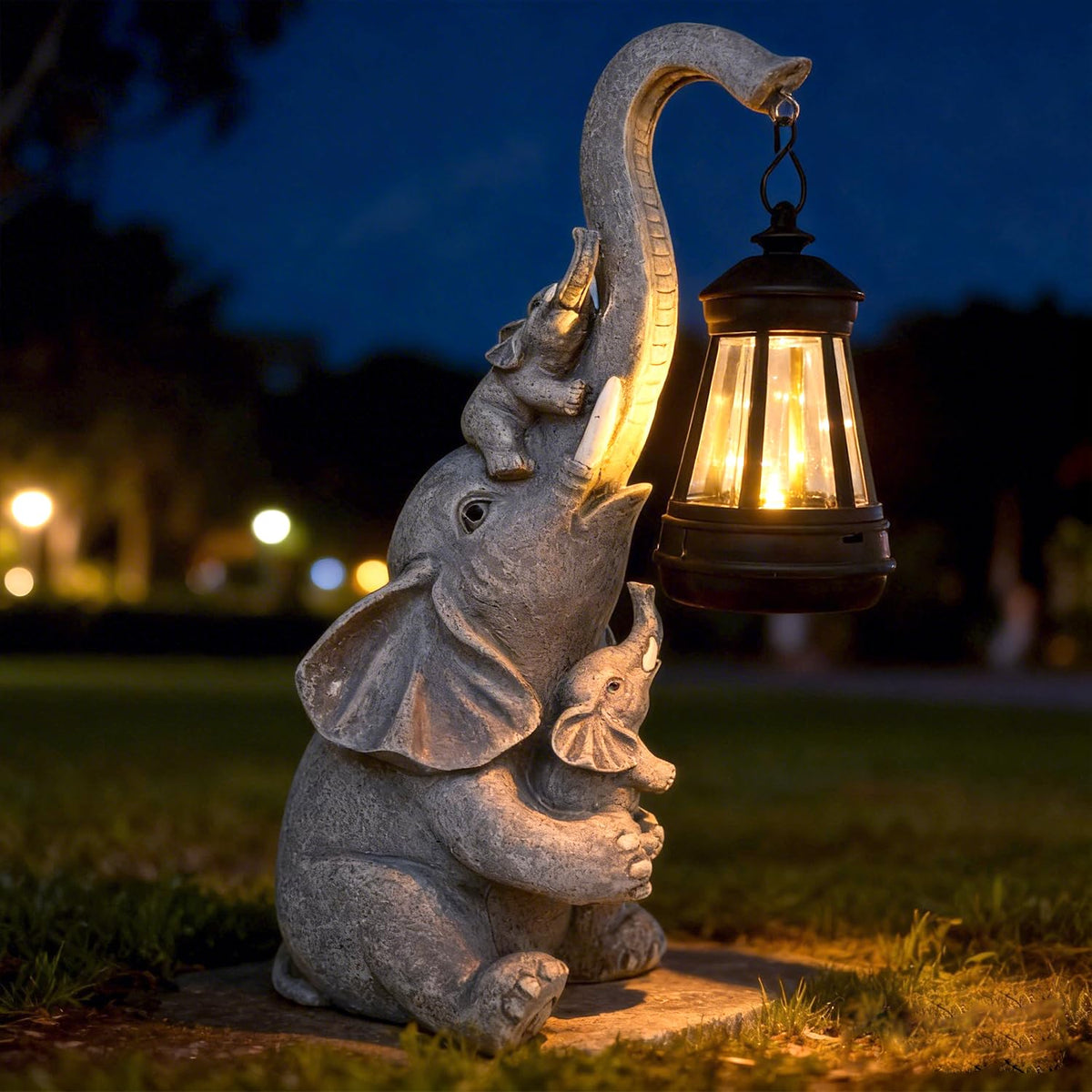 Hulonrua elephant solar light figurine adding gentle dusk glow to garden spaces
