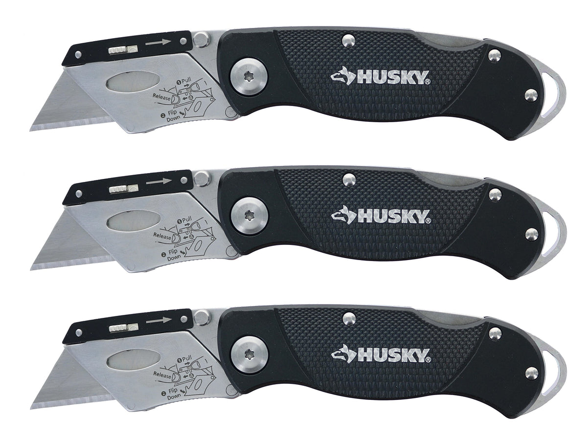 Husky folding knife with textured handle for secure grip in wet conditions.