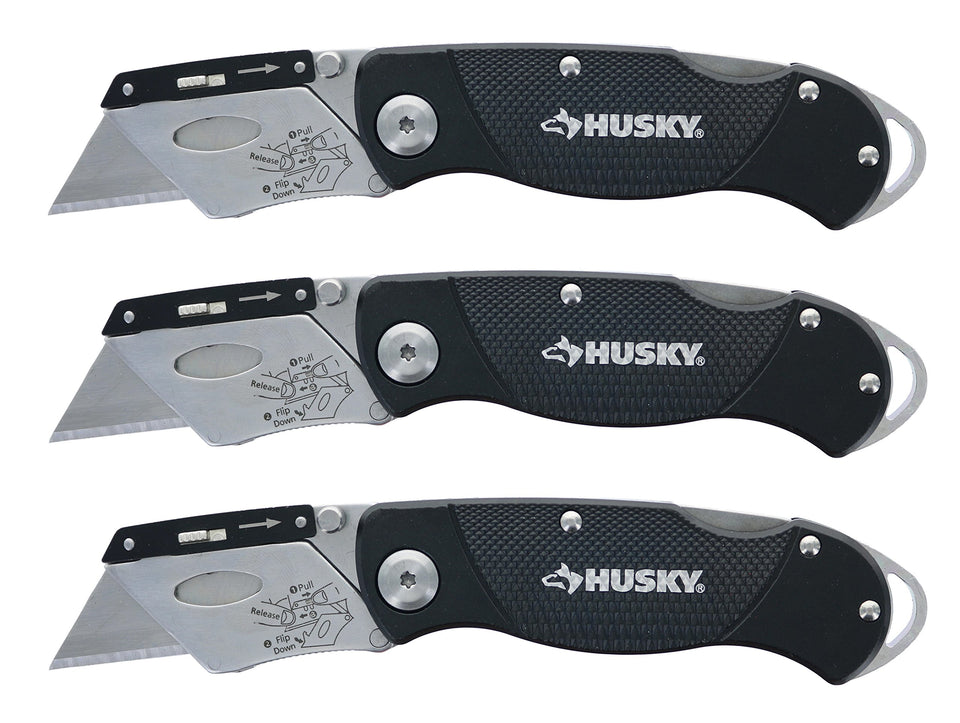 Husky folding knife with textured handle for secure grip in wet conditions.