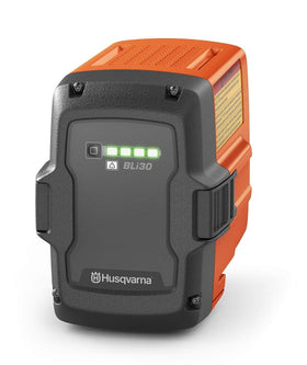 Husqvarna BLi30 battery front view powering 100- and 300-series tools.