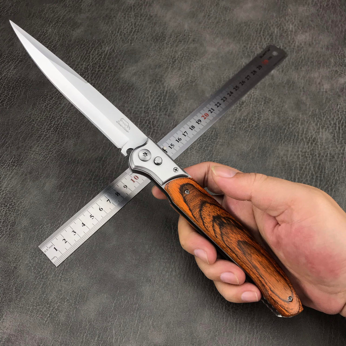 HUAAO knife in pocket scene shows discreet carry and ready accessibility.
