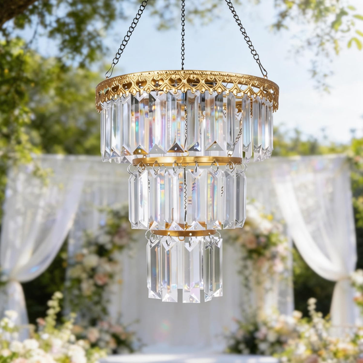 HUYIENO solar hanging crystal chandelier lights up the patio with warm glow.