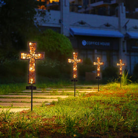 HUYIENO Solar Cross Stake night-lit memorial for quiet reflection in outdoor spaces.