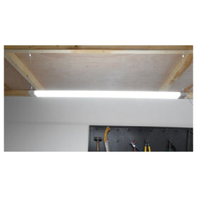 Hykolity 4ft LED shop light brightening a real garage workspace