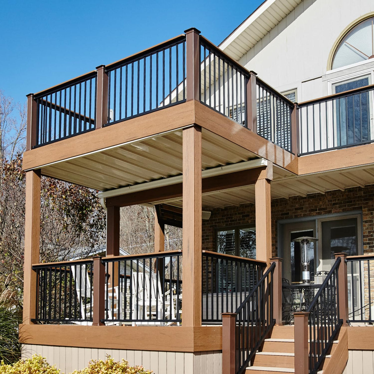 Hypergiant black deck balusters for modern rail aesthetics.