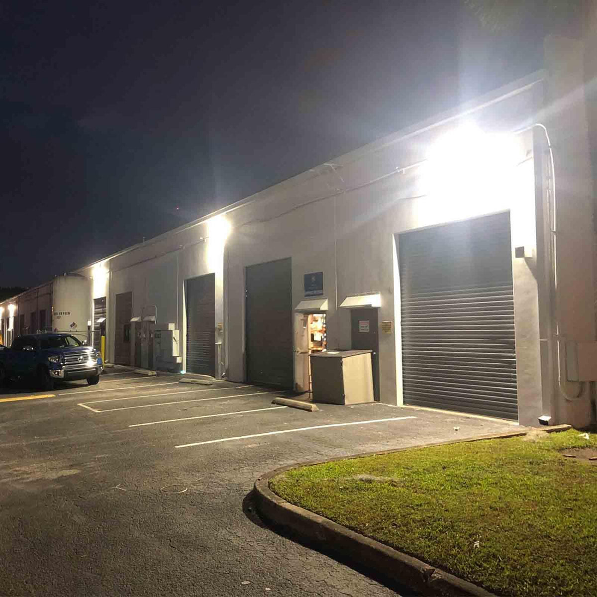 Glass lens keeps clarity on Hyperlite 120W wall pack exterior light.