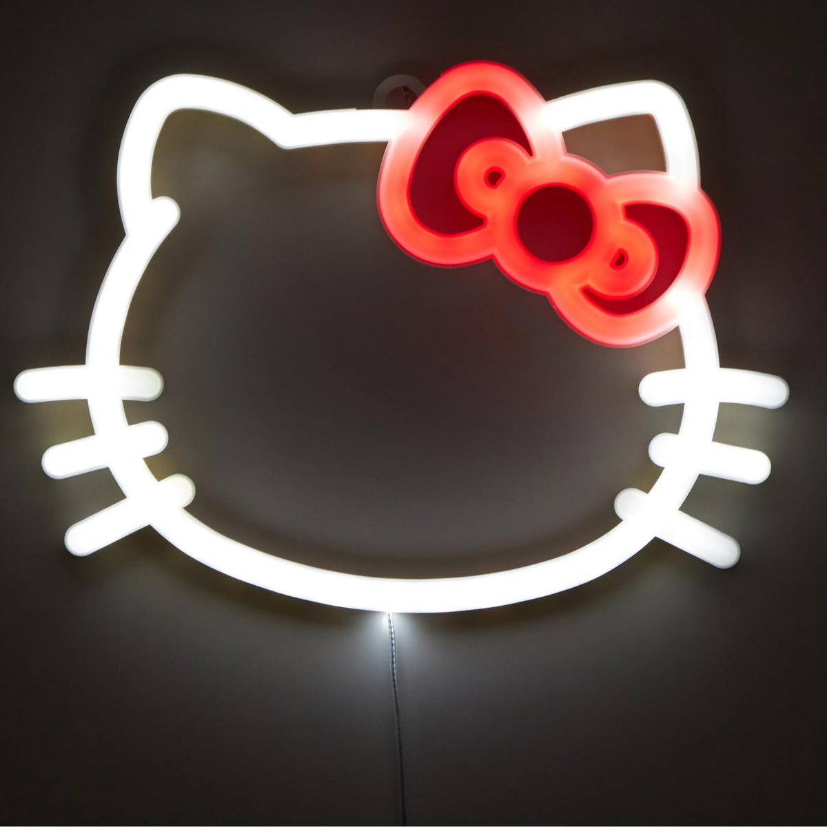 Idea Nuova Hello Kitty LED neon wall light glows brightly for a playful kid's room.