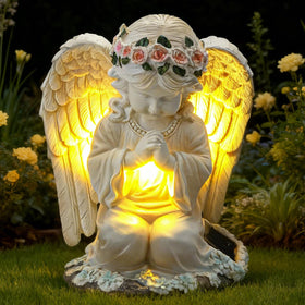 IDEA SHOW solar angel garden statue in bright sunshine for serene outdoor decor