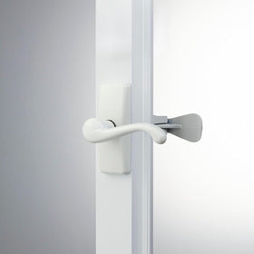 Night latch close-up on Ideal Security GL lever handle set demonstrates interior locking