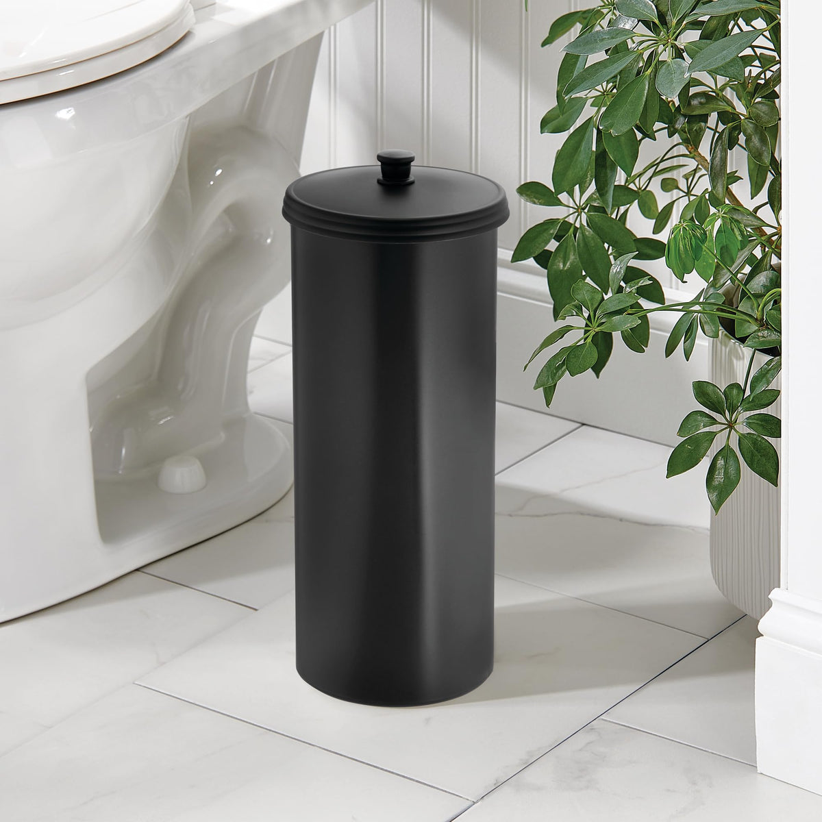 iDesign Kent three-roll capacity demonstrates keeping extra tissue neatly on hand.