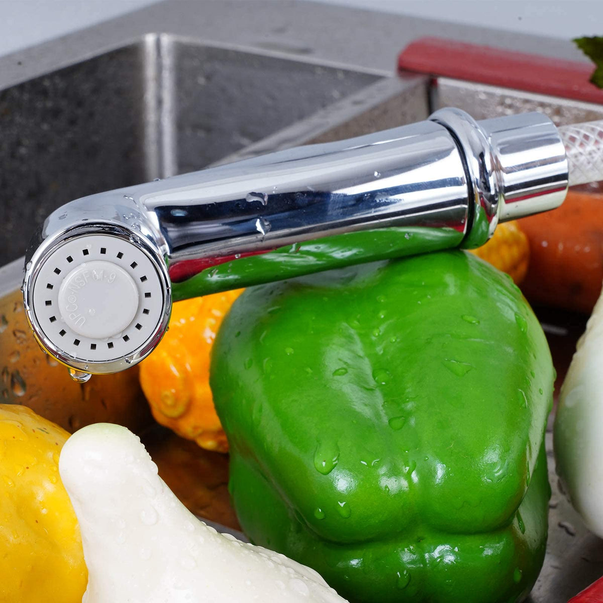 iFealClear sprayer holder keeps the head accessible on the faucet.