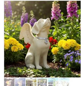 iHeartDogs angel statue lit at night, creating comforting garden ambiance.