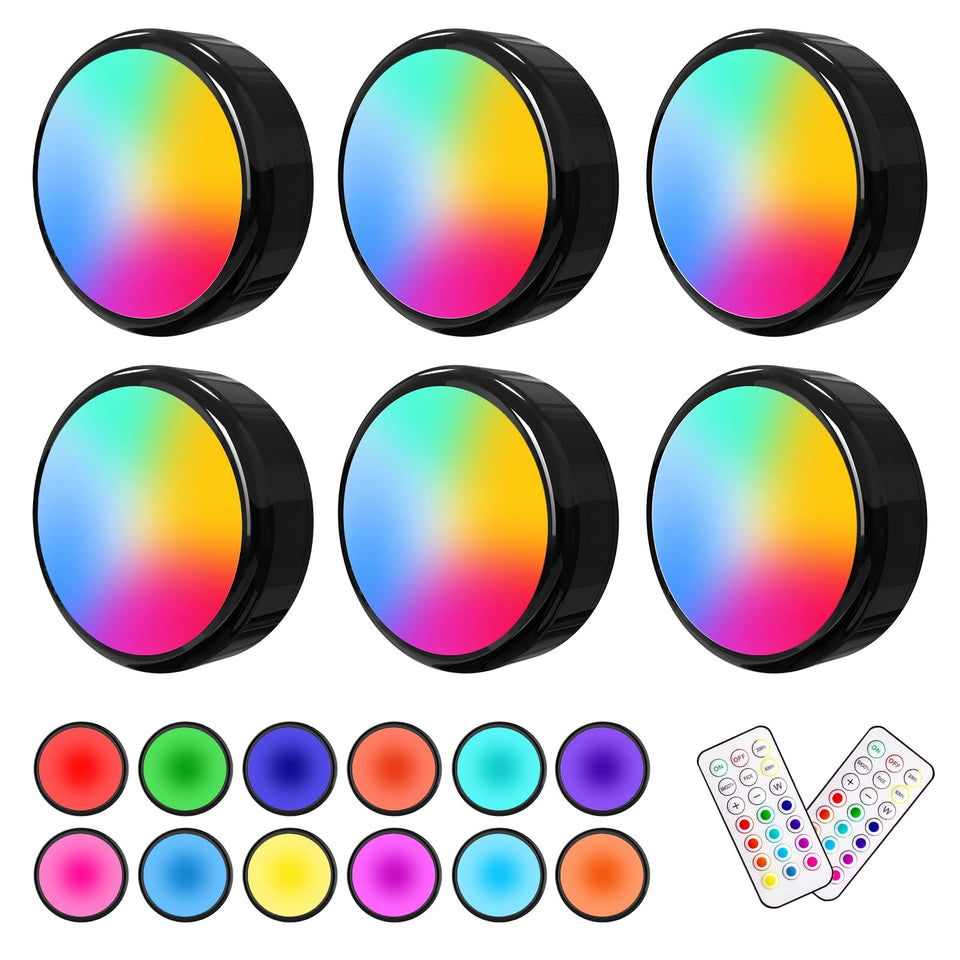 ILYXY LED puck lights with remote for under-cabinet illumination.