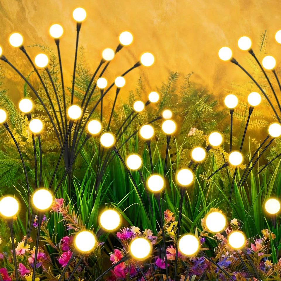 InBoboli solar firefly garden lights brighten garden paths with warm white glow.