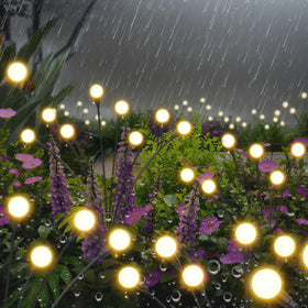 InBoboli solar firefly pathway lights guide steps with soft illumination.