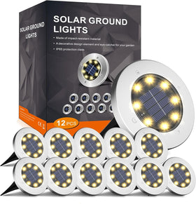 INCX solar ground light illuminates garden paths with warm white glow at dusk