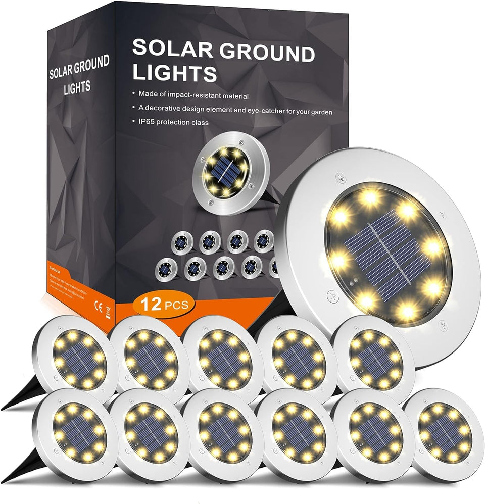 INCX solar ground light illuminates garden paths with warm white glow at dusk