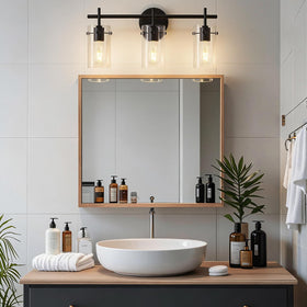 Indoi 3-light matte black vanity light with glass shades, close-up detail and clarity.