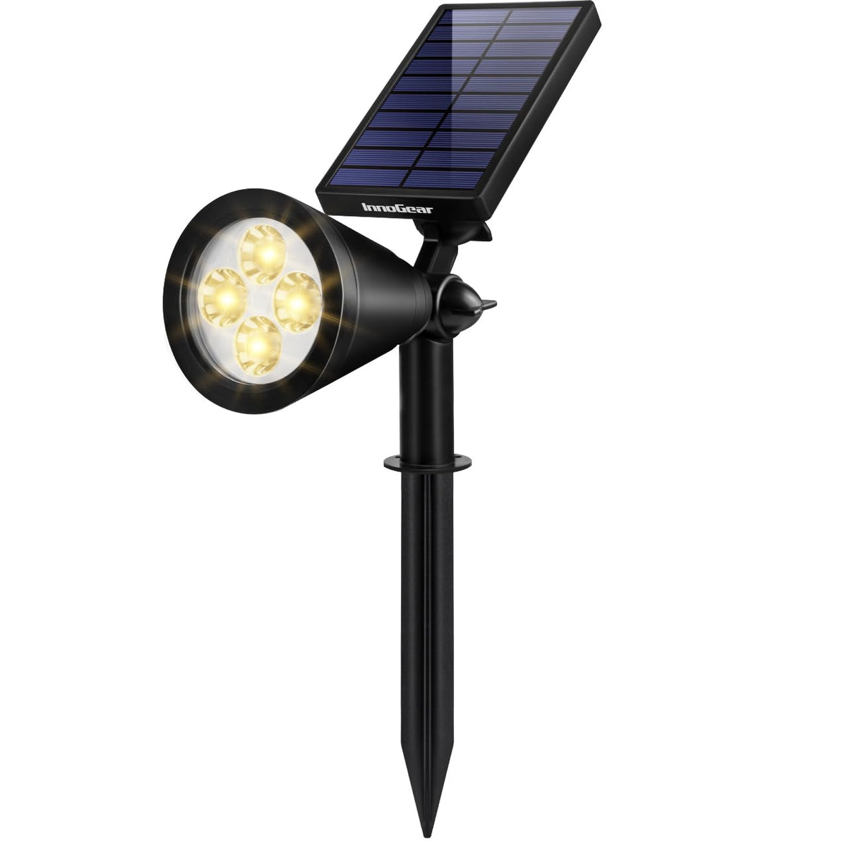 InnoGear solar spot light with warm white glow lighting flags and landscapes.