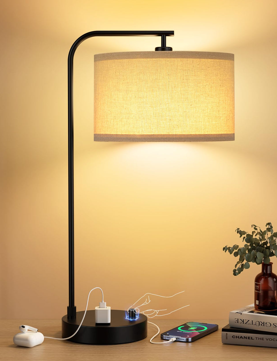 Innqoo tall table lamp with USB port and outlet for bedside charging.