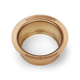 InSinkErator FLG-BB brushed bronze flange close-up enhances kitchen aesthetics.
