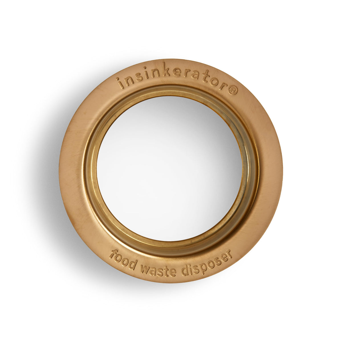 InSinkErator brushed bronze flange on sink demonstrates durable, easy-care hardware.