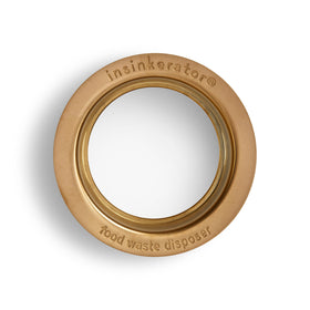 InSinkErator brushed bronze flange on sink demonstrates durable, easy-care hardware.