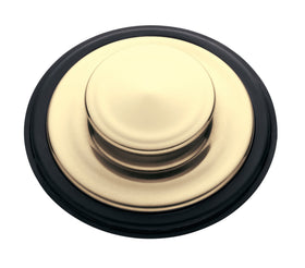 Close-up of French Gold finish stopper enhancing kitchen style while keeping water out of the drain.
