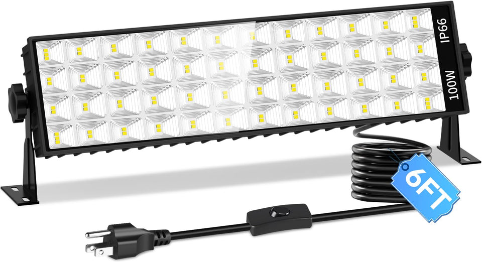 ISUERFY 100W LED Shop Light front view brightening a dim garage workspace